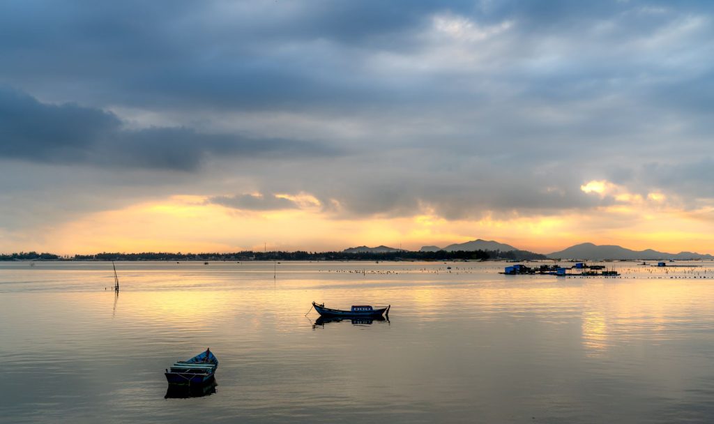 Boat on a lake at sunset